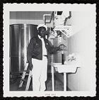 Employee, African American, Pepsi-Cola plant, black and whtie photograph